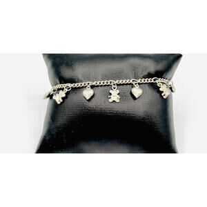 Sterling silver curbed link teddy bear and heart charm bracelet
